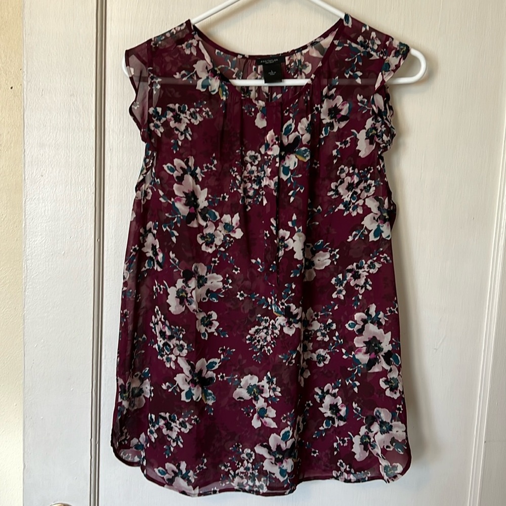 Burgundy semi sheer floral blouse with flutter detail on shoulder